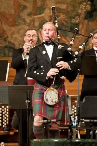 Pipe Major Scott Larson performs at the 2012 edition of the Pipes of Christmas