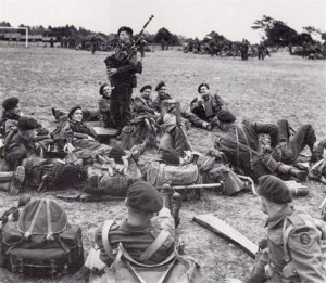 Bill Millin playing for his fellow troops in 1944