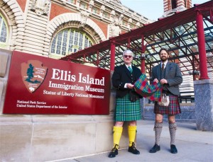 Robert Currie (left) and Matt Newsome (right) display the new Ellis Island tartan. Photo by Evan Goldman